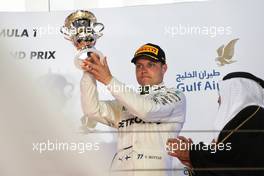 Valtteri Bottas (FIN) Mercedes AMG F1 celebrates his third position on the podium. 16.04.2017. Formula 1 World Championship, Rd 3, Bahrain Grand Prix, Sakhir, Bahrain, Race Day.
