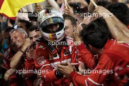 Race winner Sebastian Vettel (GER) Ferrari celebrates in parc ferme. 16.04.2017. Formula 1 World Championship, Rd 3, Bahrain Grand Prix, Sakhir, Bahrain, Race Day.
