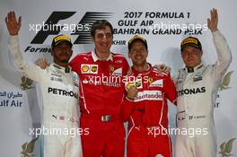 1st place for Sebastian Vettel (GER) Ferrari SF70H, 2nd for Lewis Hamilton (GBR) Mercedes AMG F1 W08 and 3rd for Valtteri Bottas (FIN) Mercedes AMG F1 W08. 16.04.2017. Formula 1 World Championship, Rd 3, Bahrain Grand Prix, Sakhir, Bahrain, Race Day.