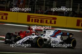 Felipe Massa (BRA) Williams FW40 and Kimi Raikkonen (FIN) Ferrari SF70H battle for position. 16.04.2017. Formula 1 World Championship, Rd 3, Bahrain Grand Prix, Sakhir, Bahrain, Race Day.