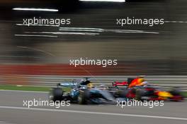 Lewis Hamilton (GBR) Mercedes AMG F1  and Daniel Ricciardo (AUS) Red Bull Racing  16.04.2017. Formula 1 World Championship, Rd 3, Bahrain Grand Prix, Sakhir, Bahrain, Race Day.