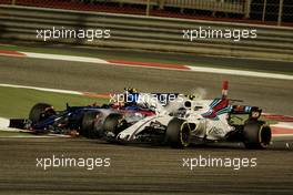 Carlos Sainz Jr (ESP) Scuderia Toro Rosso STR12 and Lance Stroll (CDN) Williams FW40 crash. 16.04.2017. Formula 1 World Championship, Rd 3, Bahrain Grand Prix, Sakhir, Bahrain, Race Day.