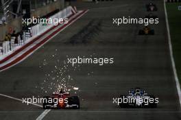 Kimi Raikkonen (FIN) Ferrari SF70H and Felipe Massa (BRA) Williams FW40 battle for position. 16.04.2017. Formula 1 World Championship, Rd 3, Bahrain Grand Prix, Sakhir, Bahrain, Race Day.