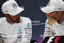 (L to R): Lewis Hamilton (GBR) Mercedes AMG F1 and vobp in the FIA Press Conference. 15.04.2017. Formula 1 World Championship, Rd 3, Bahrain Grand Prix, Sakhir, Bahrain, Qualifying Day.