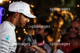 Lewis Hamilton (GBR) Mercedes AMG F1 with the media. 15.04.2017. Formula 1 World Championship, Rd 3, Bahrain Grand Prix, Sakhir, Bahrain, Qualifying Day.