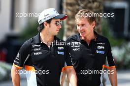 (L to R): Sergio Perez (MEX) Sahara Force India F1 with Xavi Martos (ESP) Sahara Force India F1 Team Physio. 15.04.2017. Formula 1 World Championship, Rd 3, Bahrain Grand Prix, Sakhir, Bahrain, Qualifying Day.