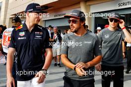 (L to R): Max Verstappen (NLD) Red Bull Racing with Fernando Alonso (ESP) McLaren and Stoffel Vandoorne (BEL) McLaren on the drivers parade. 16.04.2017. Formula 1 World Championship, Rd 3, Bahrain Grand Prix, Sakhir, Bahrain, Race Day.