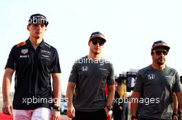 (L to R): Max Verstappen (NLD) Red Bull Racing; Stoffel Vandoorne (BEL) McLaren; and Fernando Alonso (ESP) McLaren, on the drivers parade. 16.04.2017. Formula 1 World Championship, Rd 3, Bahrain Grand Prix, Sakhir, Bahrain, Race Day.