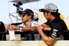 (L to R): Felipe Massa (BRA) Williams with Sergio Perez (MEX) Sahara Force India F1 on the drivers parade. 16.04.2017. Formula 1 World Championship, Rd 3, Bahrain Grand Prix, Sakhir, Bahrain, Race Day.