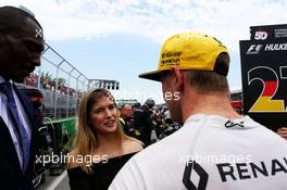 Nico Hulkenberg (GER) Renault Sport F1 Team with Bismack Biyombo, NBA Basketball Player and Eugenie Bouchard (CDN) Tennis Player on the grid. 11.06.2017. Formula 1 World Championship, Rd 7, Canadian Grand Prix, Montreal, Canada, Race Day.