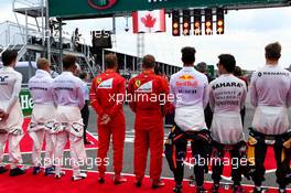 Drivers as the grid observes the national anthem. 11.06.2017. Formula 1 World Championship, Rd 7, Canadian Grand Prix, Montreal, Canada, Race Day.