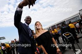 (L to R): Bismack Biyombo, NBA Basketball Player and Eugenie Bouchard (CDN) Tennis Player on the grid with the Renault Sport F1 Team. 11.06.2017. Formula 1 World Championship, Rd 7, Canadian Grand Prix, Montreal, Canada, Race Day.