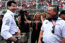 (L to R): Toto Wolff (GER) Mercedes AMG F1 Shareholder and Executive Director with Zak Brown (USA) McLaren Executive Director on the grid. 11.06.2017. Formula 1 World Championship, Rd 7, Canadian Grand Prix, Montreal, Canada, Race Day.
