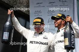 (L to R): Valtteri Bottas (FIN) Mercedes AMG F1 celebrates his second position with team mate and race winner Lewis Hamilton (GBR) Mercedes AMG F1. 11.06.2017. Formula 1 World Championship, Rd 7, Canadian Grand Prix, Montreal, Canada, Race Day.