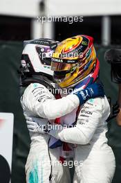 (L to R): second placed Valtteri Bottas (FIN) Mercedes AMG F1 celebrates with team mate and race winner Lewis Hamilton (GBR) Mercedes AMG F1 in parc ferme. 11.06.2017. Formula 1 World Championship, Rd 7, Canadian Grand Prix, Montreal, Canada, Race Day.