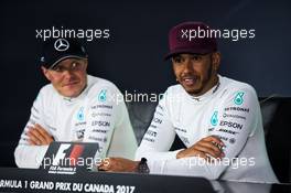 (L to R): Valtteri Bottas (FIN) Mercedes AMG F1 and Lewis Hamilton (GBR) Mercedes AMG F1 in the FIA Press Conference. 11.06.2017. Formula 1 World Championship, Rd 7, Canadian Grand Prix, Montreal, Canada, Race Day.