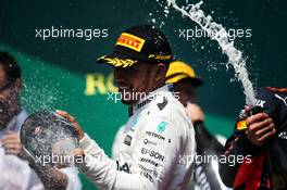 Race winner Lewis Hamilton (GBR) Mercedes AMG F1 celebrates with the champagne on the podium. 11.06.2017. Formula 1 World Championship, Rd 7, Canadian Grand Prix, Montreal, Canada, Race Day.