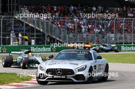 Lewis Hamilton (GBR) Mercedes AMG F1 W08 leads behind the FIA Safety Car. 11.06.2017. Formula 1 World Championship, Rd 7, Canadian Grand Prix, Montreal, Canada, Race Day.