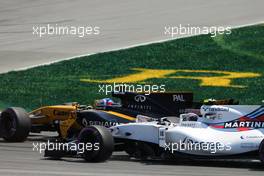 Lance Stroll (CDN) Williams FW40 and Jolyon Palmer (GBR) Renault Sport F1 Team RS17 battle for position. 11.06.2017. Formula 1 World Championship, Rd 7, Canadian Grand Prix, Montreal, Canada, Race Day.