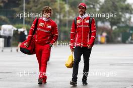 Sebastian Vettel (GER) Ferrari with Antti Kontsas (FIN) Personal Trainer. 07.04.2017. Formula 1 World Championship, Rd 2, Chinese Grand Prix, Shanghai, China, Practice Day.