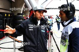 Sergio Perez (MEX) Sahara Force India F1 with Karun Chandhok (IND) Channel 4 Technical Analyst. 07.04.2017. Formula 1 World Championship, Rd 2, Chinese Grand Prix, Shanghai, China, Practice Day.