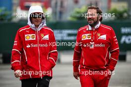 Kimi Raikkonen (FIN) Ferrari with Gino Rosato (CDN) Ferrari. 07.04.2017. Formula 1 World Championship, Rd 2, Chinese Grand Prix, Shanghai, China, Practice Day.