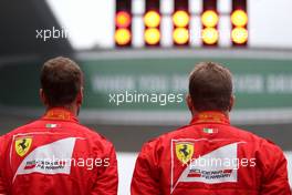 Kimi Raikkonen (FIN) Scuderia Ferrari and Sebastian Vettel (GER) Scuderia Ferrari  09.04.2017. Formula 1 World Championship, Rd 2, Chinese Grand Prix, Shanghai, China, Race Day.