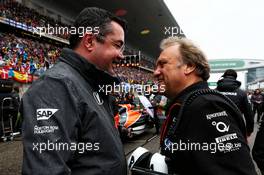 (L to R): Eric Boullier (FRA) McLaren Racing Director with Robert Fernley (GBR) Sahara Force India F1 Team Deputy Team Principal on the grid. 09.04.2017. Formula 1 World Championship, Rd 2, Chinese Grand Prix, Shanghai, China, Race Day.