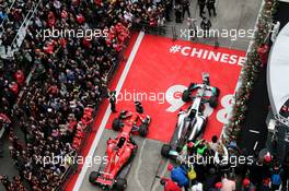 Race winner Lewis Hamilton (GBR) Mercedes AMG F1 and Sebastian Vettel (GER) Ferrari celebrate on the podium. 09.04.2017. Formula 1 World Championship, Rd 2, Chinese Grand Prix, Shanghai, China, Race Day.