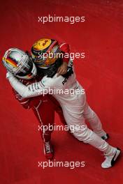 Race winner Lewis Hamilton (GBR) Mercedes AMG F1 celebrates in parc ferme with second placed Sebastian Vettel (GER) Ferrari. 09.04.2017. Formula 1 World Championship, Rd 2, Chinese Grand Prix, Shanghai, China, Race Day.