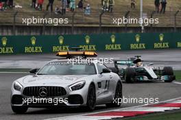 Lewis Hamilton (GBR) Mercedes AMG F1 W08 leads behind the FIA Safety Car. 09.04.2017. Formula 1 World Championship, Rd 2, Chinese Grand Prix, Shanghai, China, Race Day.