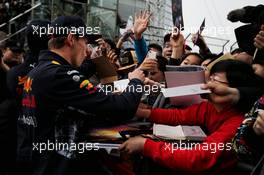 Max Verstappen (NLD) Red Bull Racing signs autographs for the fans. 06.04.2017. Formula 1 World Championship, Rd 2, Chinese Grand Prix, Shanghai, China, Preparation Day.