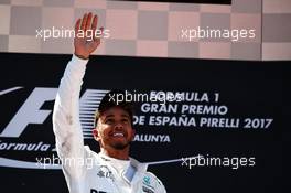 Race winner Lewis Hamilton (GBR) Mercedes AMG F1 celebrates on the podium. 14.05.2017. Formula 1 World Championship, Rd 5, Spanish Grand Prix, Barcelona, Spain, Race Day.