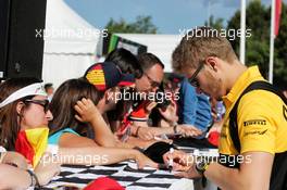 Sergey Sirotkin (RUS) Renault Sport F1 Team Third Driver signs autographs for the fans. 14.05.2017. Formula 1 World Championship, Rd 5, Spanish Grand Prix, Barcelona, Spain, Race Day.