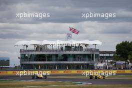 Rene Arnoux (FRA) in the Renault RS01 and Frank Montangy (FRA) in the Renault RE40. 14.07.2017. Formula 1 World Championship, Rd 10, British Grand Prix, Silverstone, England, Practice Day.