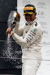 Race winner Lewis Hamilton (GBR) Mercedes AMG F1 celebrates on the podium. 16.07.2017. Formula 1 World Championship, Rd 10, British Grand Prix, Silverstone, England, Race Day.