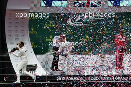 The podium (L to R): Race winner Lewis Hamilton (GBR) Mercedes AMG F1 celebrates with team mate Valtteri Bottas (FIN) Mercedes AMG F1 and Kimi Raikkonen (FIN) Ferrari. 16.07.2017. Formula 1 World Championship, Rd 10, British Grand Prix, Silverstone, England, Race Day.