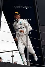 Race winner Lewis Hamilton (GBR) Mercedes AMG F1 on the podium. 16.07.2017. Formula 1 World Championship, Rd 10, British Grand Prix, Silverstone, England, Race Day.