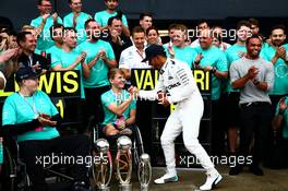Race winner Lewis Hamilton (GBR) Mercedes AMG F1 celebrates with brother Nicolas Hamilton (GBR), Billy Monger (GBR) Racing Driver, and the team. 16.07.2017. Formula 1 World Championship, Rd 10, British Grand Prix, Silverstone, England, Race Day.