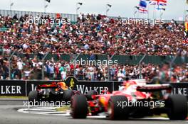 Max Verstappen (NLD) Red Bull Racing RB13 leads Sebastian Vettel (GER) Ferrari SF70H. 16.07.2017. Formula 1 World Championship, Rd 10, British Grand Prix, Silverstone, England, Race Day.