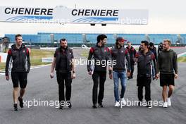 Antonio Giovinazzi (ITA) Haas F1 Team Test Driver and Kevin Magnussen (DEN) Haas F1 Team walk the circuit with the team. 13.07.2017. Formula 1 World Championship, Rd 10, British Grand Prix, Silverstone, England, Preparation Day.