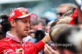 Sebastian Vettel (GER) Ferrari signs autographs for the fans. 13.07.2017. Formula 1 World Championship, Rd 10, British Grand Prix, Silverstone, England, Preparation Day.