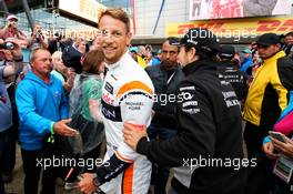 (L to R): Jenson Button (GBR) McLaren with Sergio Perez (MEX) Sahara Force India F1. 13.07.2017. Formula 1 World Championship, Rd 10, British Grand Prix, Silverstone, England, Preparation Day.