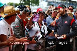 Romain Grosjean (FRA) Haas F1 Team with fans. 13.07.2017. Formula 1 World Championship, Rd 10, British Grand Prix, Silverstone, England, Preparation Day.