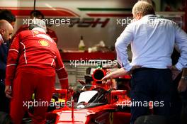 Jo Bauer (GER) FIA Delegate looks at a cockpit cover on the Ferrari SF70H of Sebastian Vettel (GER) Ferrari. 13.07.2017. Formula 1 World Championship, Rd 10, British Grand Prix, Silverstone, England, Preparation Day.