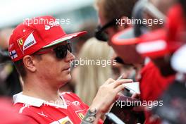 Kimi Raikkonen (FIN) Ferrari signs autographs for the fans. 13.07.2017. Formula 1 World Championship, Rd 10, British Grand Prix, Silverstone, England, Preparation Day.
