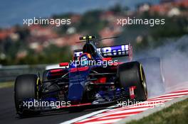 Carlos Sainz Jr (ESP) Scuderia Toro Rosso STR12 locks up under braking. 28.07.2017. Formula 1 World Championship, Rd 11, Hungarian Grand Prix, Budapest, Hungary, Practice Day.
