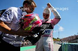 Sergio Perez (MEX) Sahara Force India F1 with Xavi Martos (ESP) Sahara Force India F1 Team Physio on the grid. 30.07.2017. Formula 1 World Championship, Rd 11, Hungarian Grand Prix, Budapest, Hungary, Race Day.