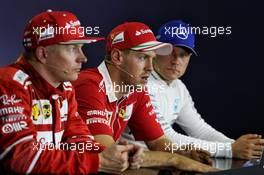 The post race FIA Press Conference (L to R): Kimi Raikkonen (FIN) Ferrari, second; Sebastian Vettel (GER) Ferrari, race winner; Valtteri Bottas (FIN) Mercedes AMG F1, third. 30.07.2017. Formula 1 World Championship, Rd 11, Hungarian Grand Prix, Budapest, Hungary, Race Day.