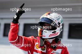 Race winner Sebastian Vettel (GER) Ferrari celebrates in parc ferme. 30.07.2017. Formula 1 World Championship, Rd 11, Hungarian Grand Prix, Budapest, Hungary, Race Day.